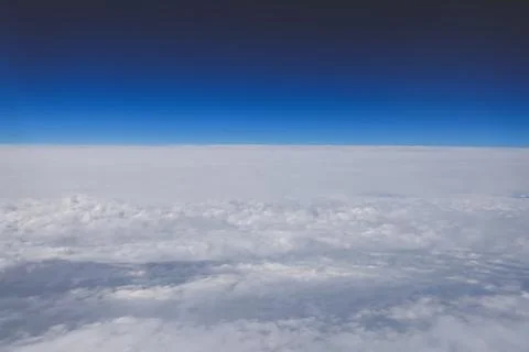 Blue Sky With Soft White Clouds Viewed From High Above Stock Photos