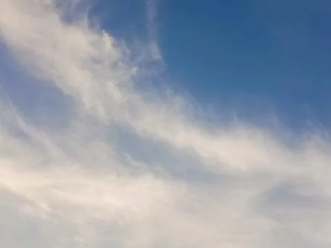 Blue Sky with Soft White Clouds Natural Background Clear Weather Atmospheric Sky 스톡 사진