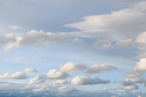 Blue sky with soft white clouds background Фото