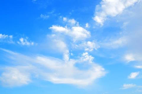 Blue sky with soft white clouds Foto stock