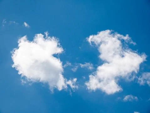 Blue sky with soft white clouds Stockfoto's