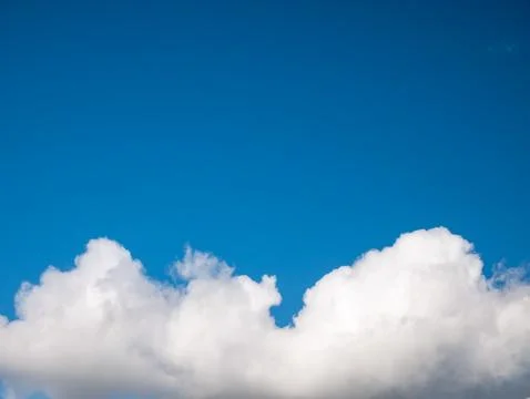 Blue sky with soft white clouds Фото