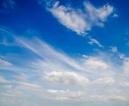 Blue Sky with Soft White Clouds Stock Photos