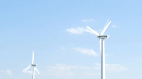 Blue sky with some clouds and two rotating wind turbines - slow motion Stock Footage 106503170