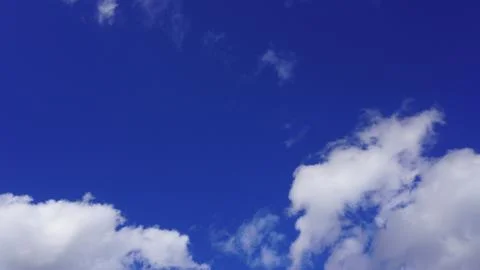 Blue sky with some nice clouds Stock Photos