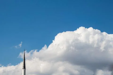 Blue Sky with some white clouds beyond minaret Stock Photos