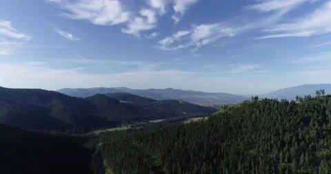 Blue sky spring mountain drone Stock Footage 187185661