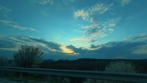 Blue sky streaks with wispy clouds above bare trees. Balkan, Eastern Europe, POV Video stock 333341904