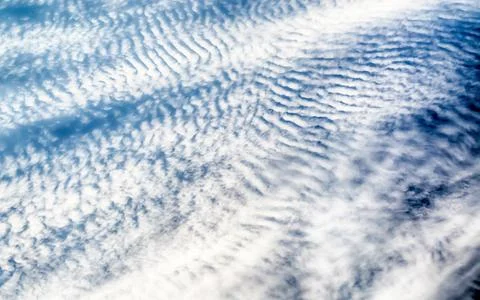 Blue Sky with Stripes Clouds Texture, may use as background Stock Photos