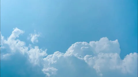 The blue sky in summer day. Blue sky and white clouds background. Nature weather Vídeo Stock 188438372