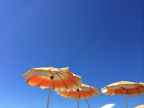 Blue Sky, Summer Umbrellas Stock Photos