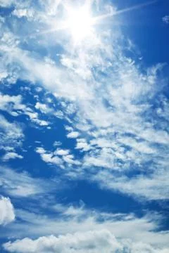 Blue sky with the sun Stock Photos