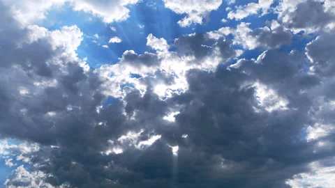 Blue Sky with Sun Ray Clouds Stock Footage 135284306