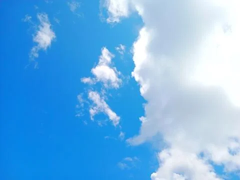 Blue sky with thick clouds Stock Photos