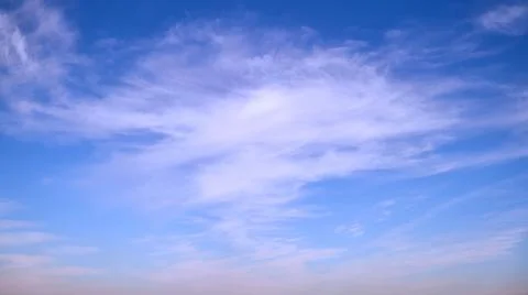Blue sky with thin cirrus clouds timelapse, daytime landscape Stock Photos