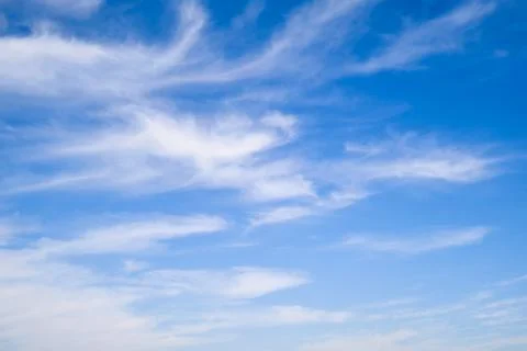 Blue sky with thin cirrus clouds, daytime landscape Stock Photos