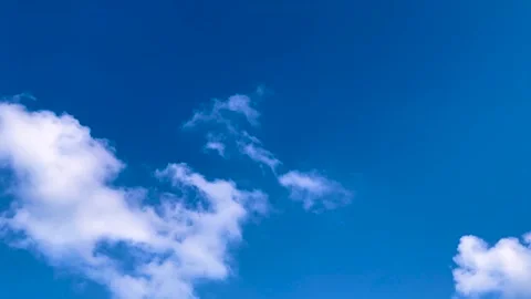 Blue Sky Timelapse with White Clouds on Light Blue Background Nature 4K Video 스톡 동영상 335186213
