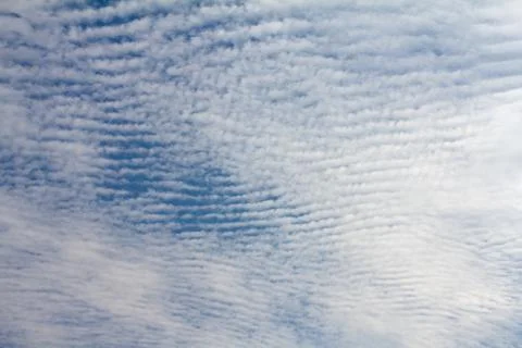Blue sky with tiny clouds background.. Stock Photos