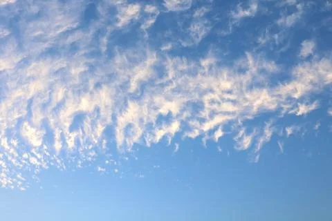 Blue sky with tiny clouds, sky background Stock Photos
