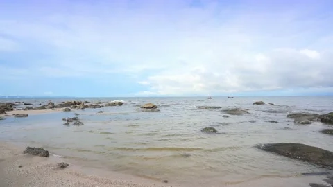 Blue sky tropical beach, view of waves break on tropical white sand beach. Stock Footage 234943831