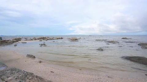 Blue sky tropical beach, view of waves break on tropical white sand beach. Stock Footage 234943837
