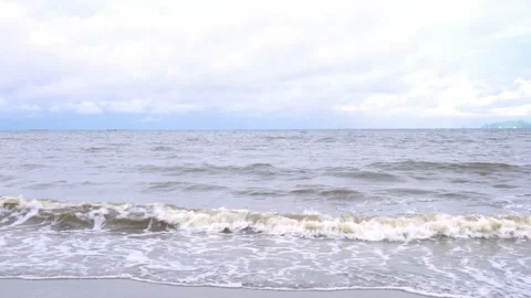 Blue sky tropical beach, view of waves break on tropical white sand beach. Stock Footage 234943900