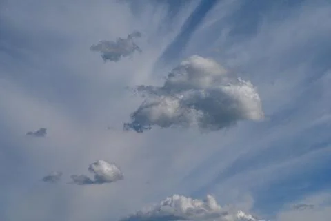 Blue sky with two layers of clouds Stock Photos