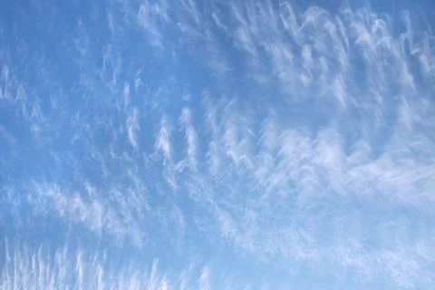 Blue sky with unusual clouds Stock Photos