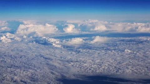 Blue sky view from airplane window Stock Footage 76877776