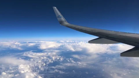 Blue sky view from airplane window Stock-Footage 80991982