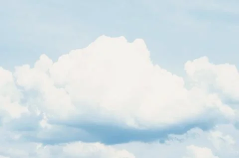 Blue sky with voluminous clouds of summer day Stock Photos
