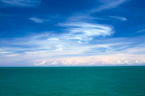 Blue sky, white cloud and sea Stock Photos