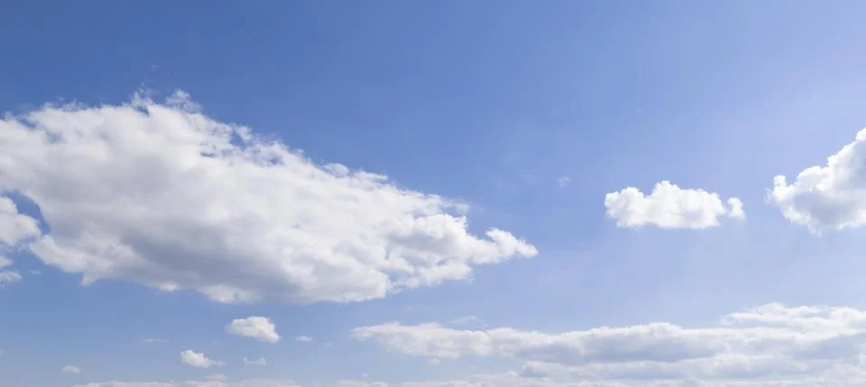 Blue sky with white cloud background. Clear blue sky and white clouds Stock Photos