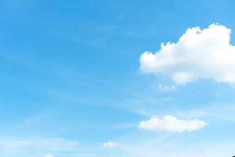 Blue sky with white cloud with copy space background. Stock Photos