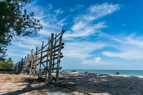 Blue sky with white cloud over the bamboo fence Stock Photos