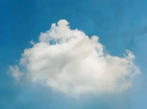 Blue sky with white cloud on paper texture. Stock Photos