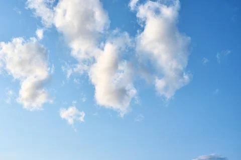 Blue sky with a white clouds, abstract background Photos