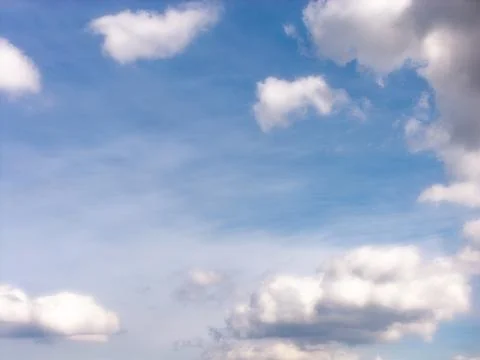 Blue Sky With White Clouds Along the Lower Edge Stock Photos