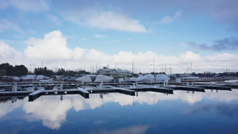 Blue sky, white clouds, and a quiet harbor Stock Footage 329200131