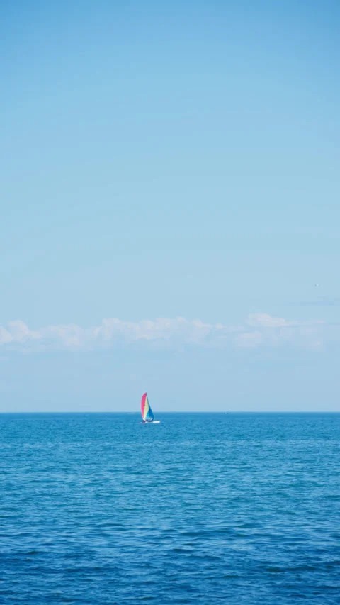 Blue sky, white clouds, and sailboat scenery Stock Footage 340989481
