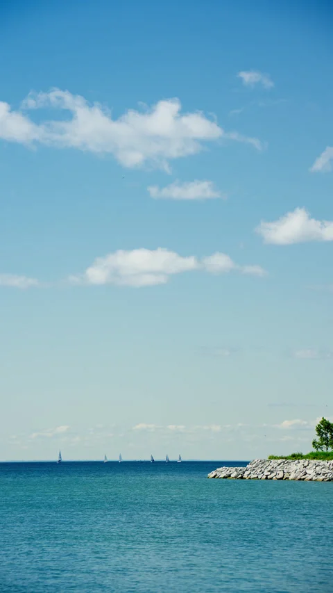 Blue sky, white clouds, and sailboat scenery Stock Footage 341360949