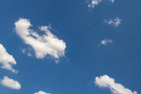 Blue sky with white clouds and copy space natural summer weather background.. Stock Photos
