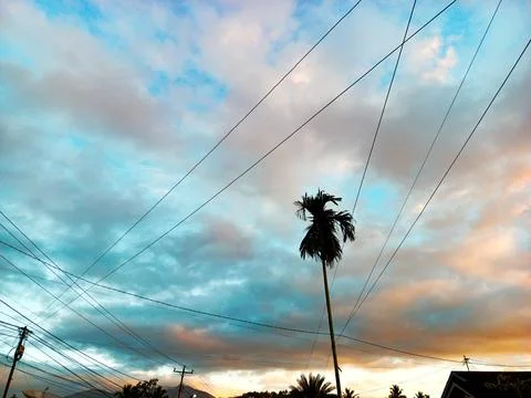 Blue Sky with White Clouds and Power Lines in Outdoor Environment Фото