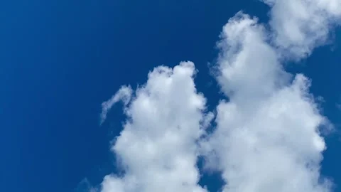 Blue Sky with White Clouds Background Stock Footage 325165067