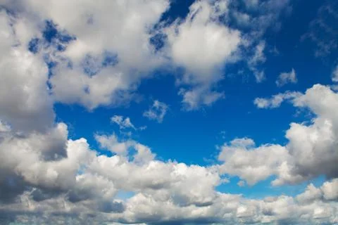 Blue sky with white clouds background Stock Photos