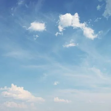 Blue sky with white clouds background Stock Photos
