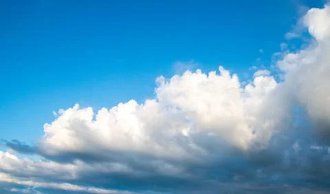 Blue sky white clouds background with cumulus clouds Stock Photos
