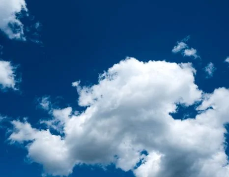 Blue sky with white clouds background, sunny day Stock Photos