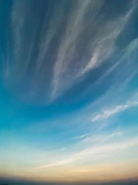 Blue sky with white clouds background. Clear sunny day Stock Photos