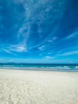 Blue sky with white clouds background. Clear sunny day Stock Photos